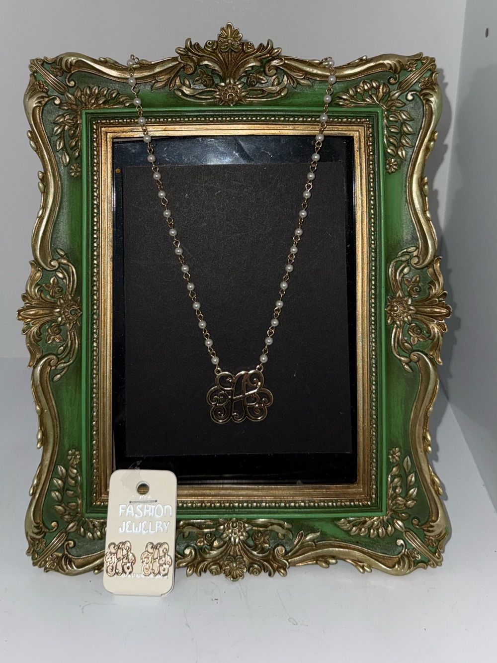 A initial necklace and earring set